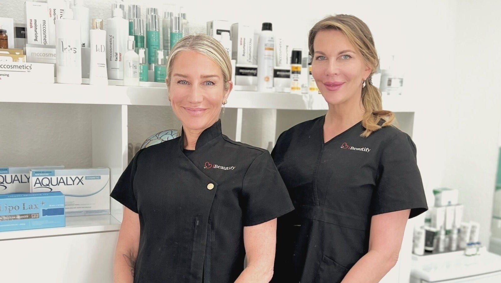 I Beautify professionals at Royal Tunbridge Wells, GB, with skincare products on display.