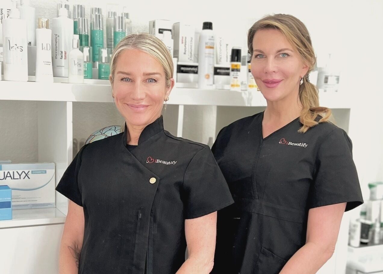 I Beautify professionals at Royal Tunbridge Wells, GB, with skincare products on display.