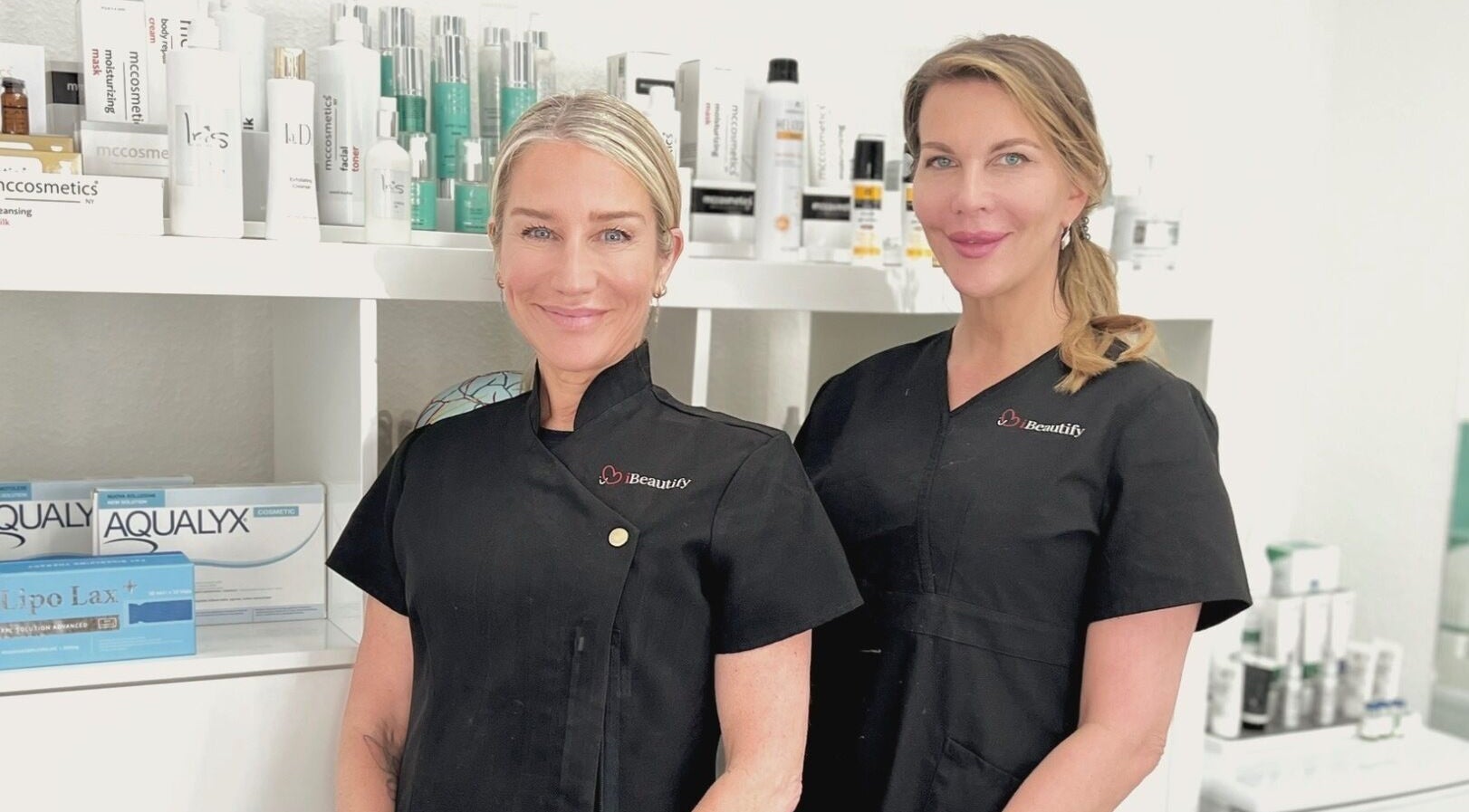 I Beautify professionals at Royal Tunbridge Wells, GB, with skincare products on display.