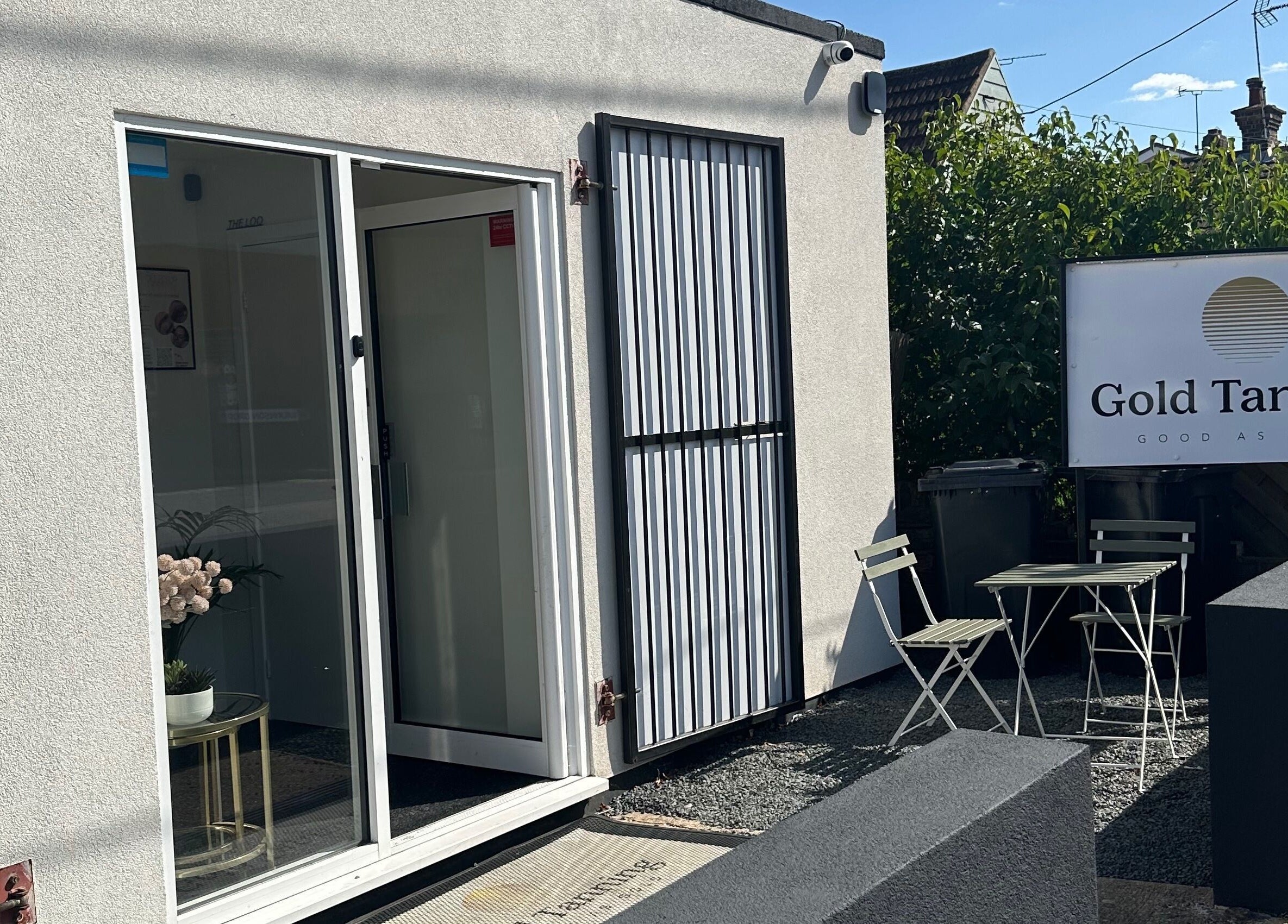 Modern exterior of Dolled Up by Alex in Hadleigh, England, GB, featuring a sleek entrance and welcoming patio.