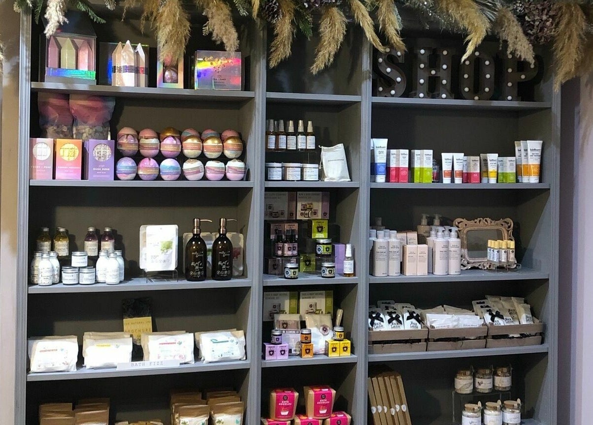 Beauty products display at BeYOUtifi, Donaghadee, Northern Ireland, GB. Shelves full of pampering essentials.