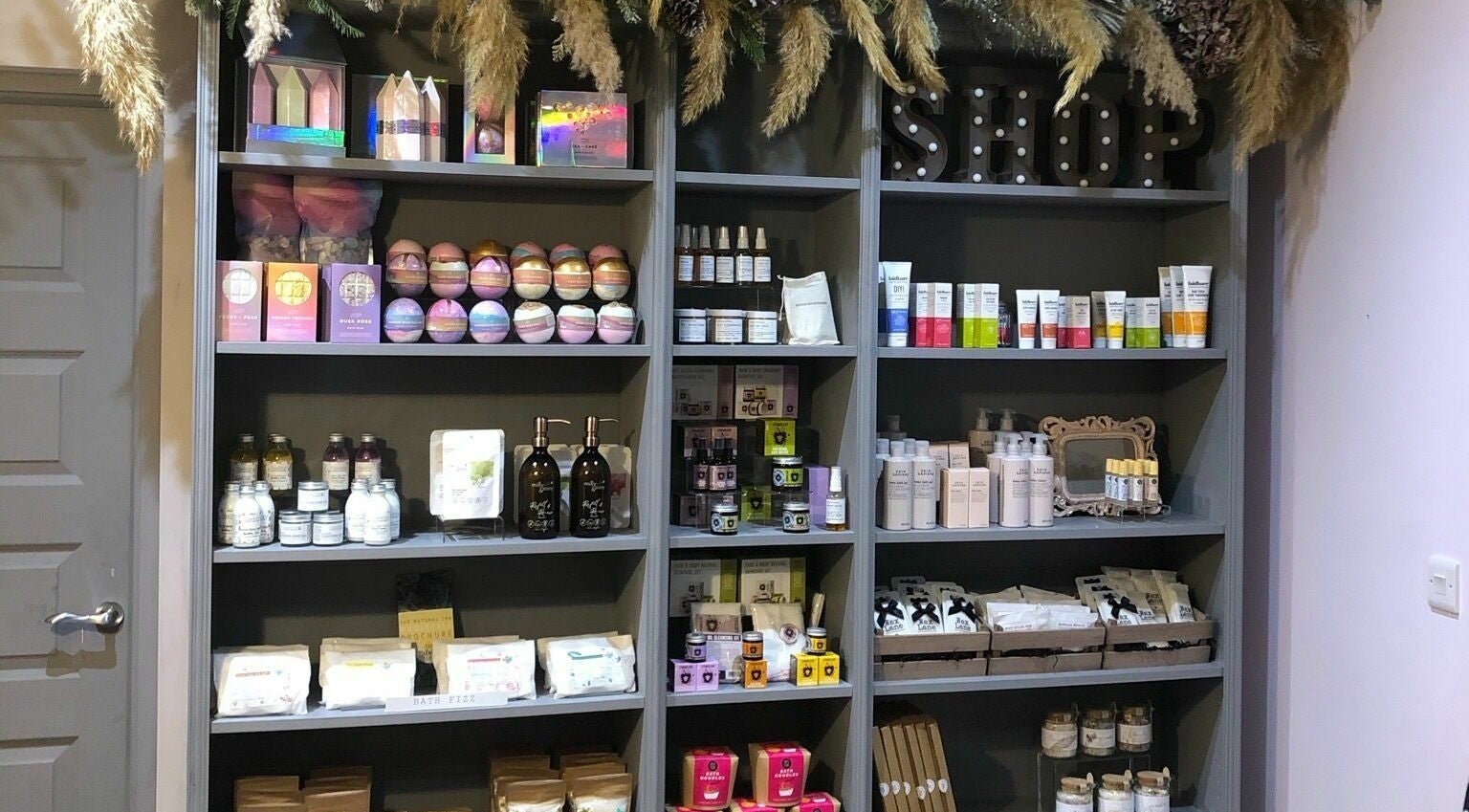 Beauty products display at BeYOUtifi, Donaghadee, Northern Ireland, GB. Shelves full of pampering essentials.