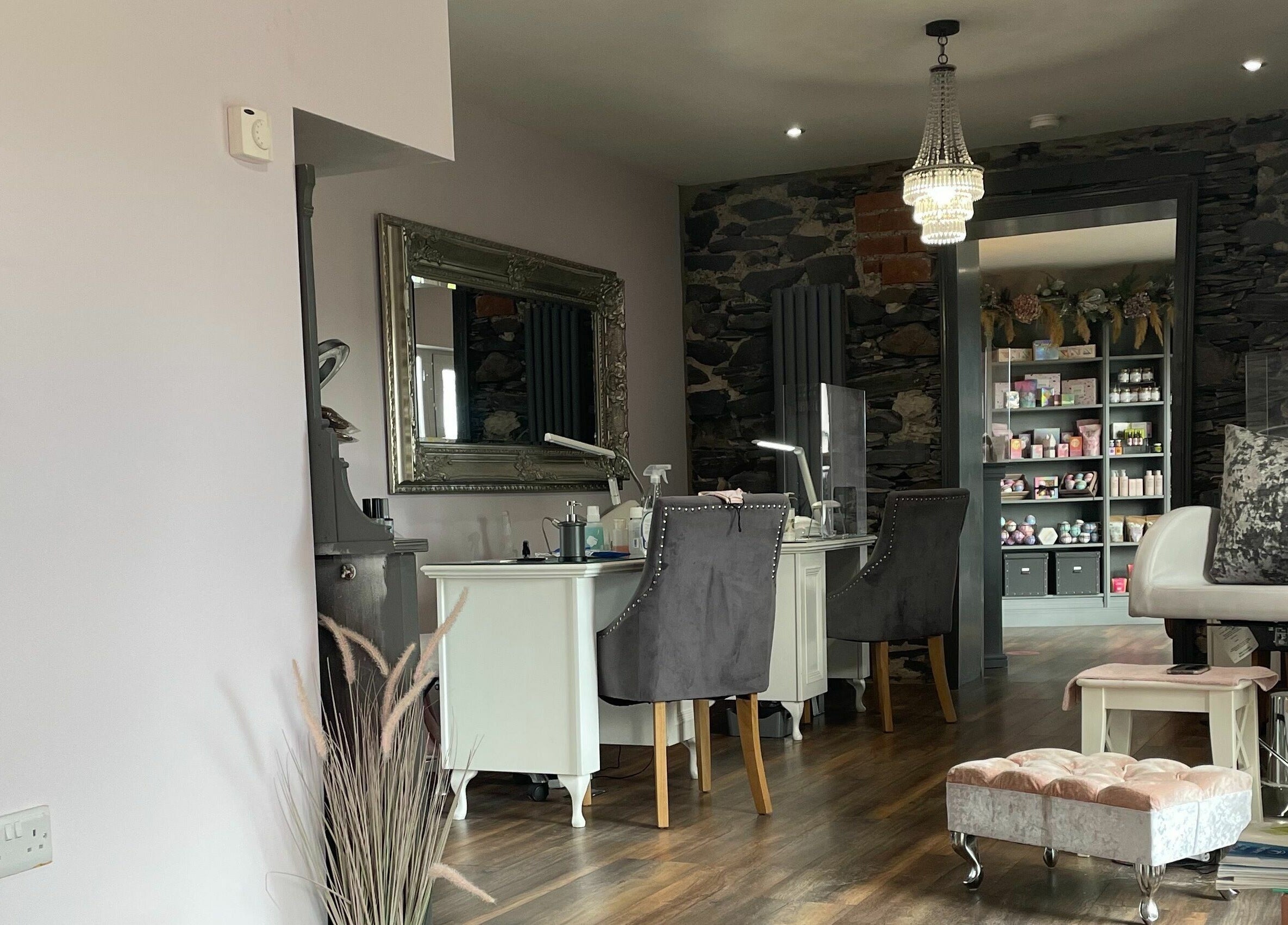 Chic interior of BeYOUtifi in Donaghadee, Northern Ireland, GB, showcasing luxurious beauty treatment area.