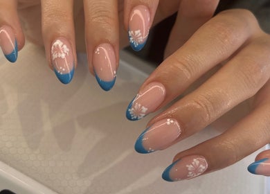 Elegant blue floral nail art at Summer Nail Club, Leigh-on-sea, England, GB.