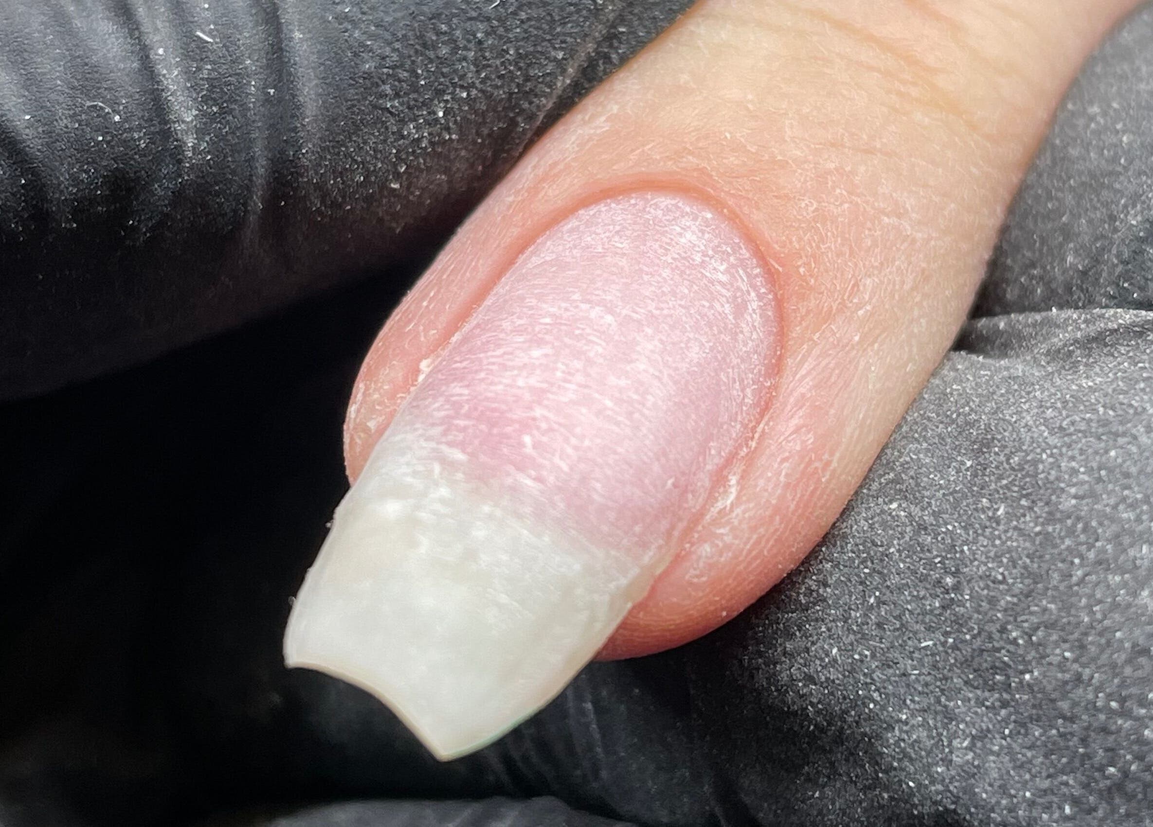 Close-up of a polished nail at Ninety Eight Nails, Glasgow, Scotland, GB.