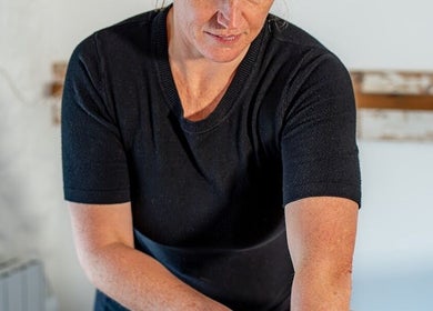 Therapist at work in Anna Booth Massage & Yoga, Nailsworth, England, GB. Creating a tranquil experience.