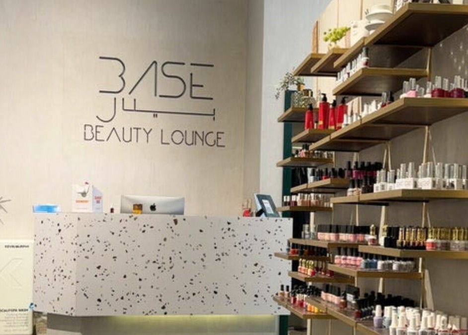 Reception area of Base Beauty Lounge I بيس بيوتي لاونج in Al Hofuf, Eastern Province, SA, showcasing beauty products.