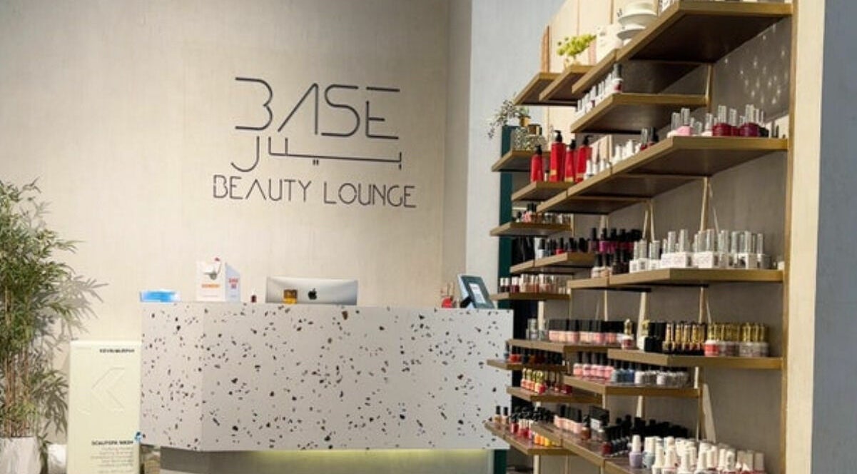 Reception area of Base Beauty Lounge I بيس بيوتي لاونج in Al Hofuf, Eastern Province, SA, showcasing beauty products.