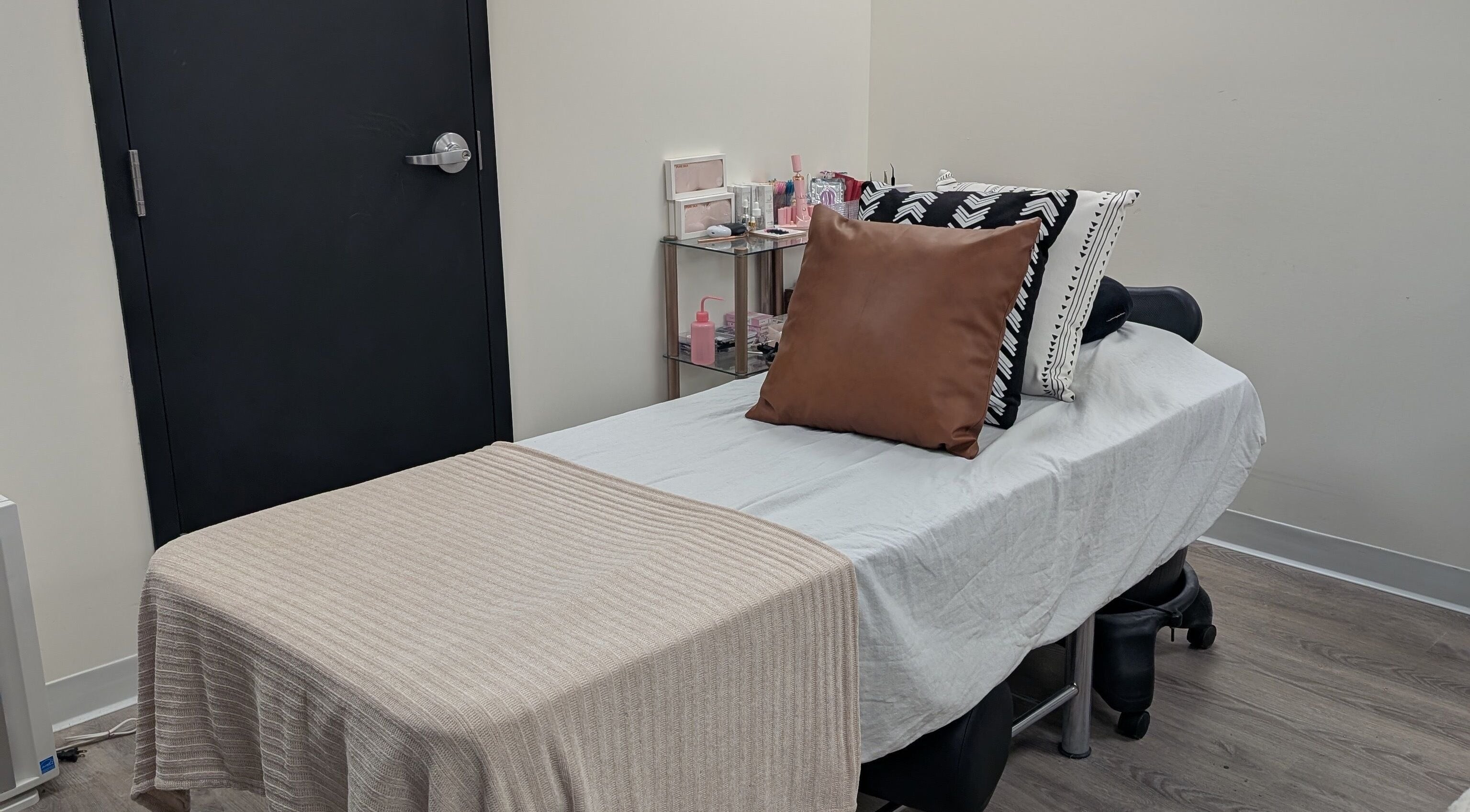 Treatment bed at Shana’s Beauty - Lashes and Esthetics, Eckville AB, offering relaxing spa ambiance.