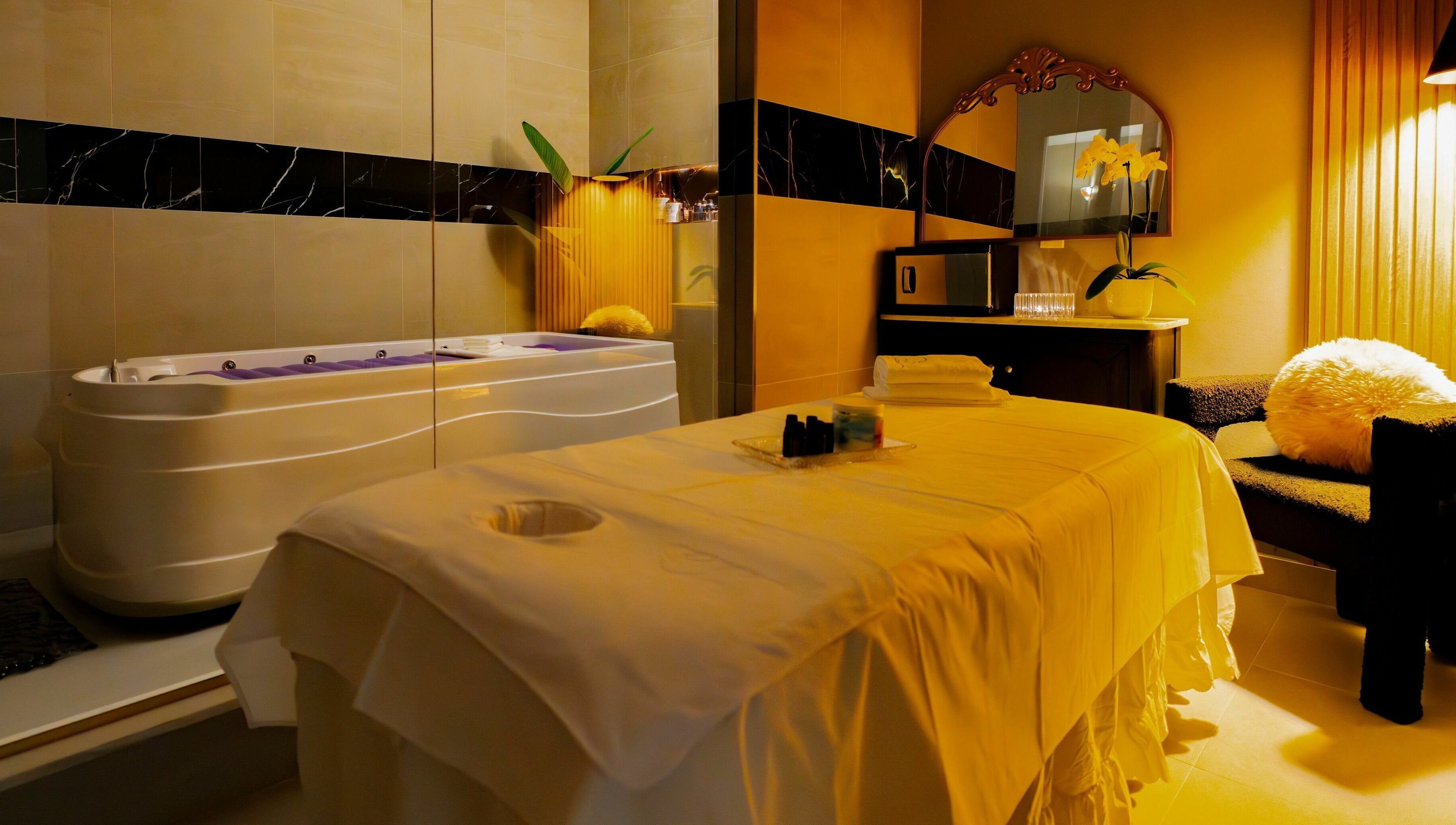 Tranquil massage room with jacuzzi at In The Cloud Spa, Toronto, Ontario, CA, offering ultimate relaxation.