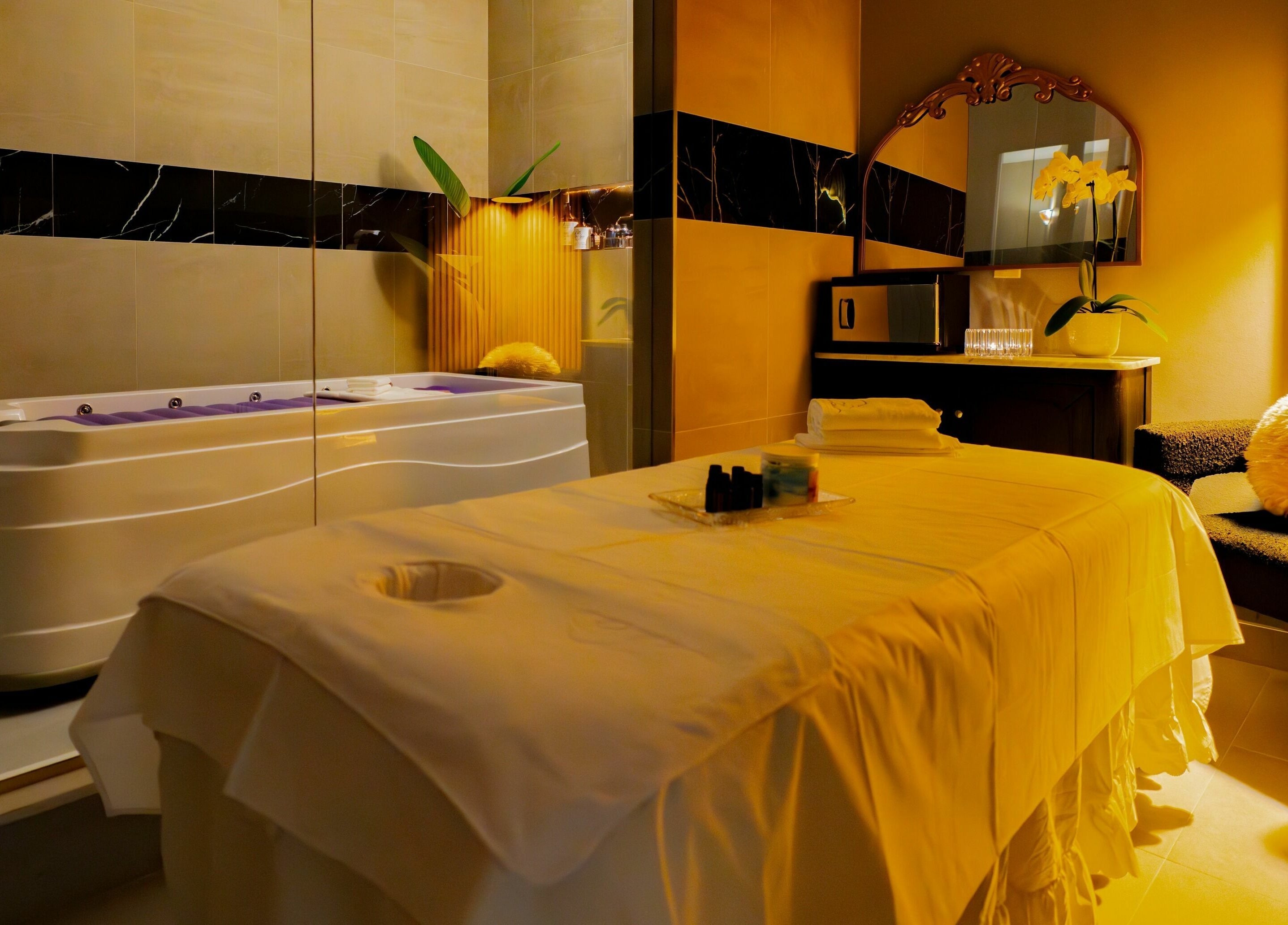 Tranquil massage room with jacuzzi at In The Cloud Spa, Toronto, Ontario, CA, offering ultimate relaxation.