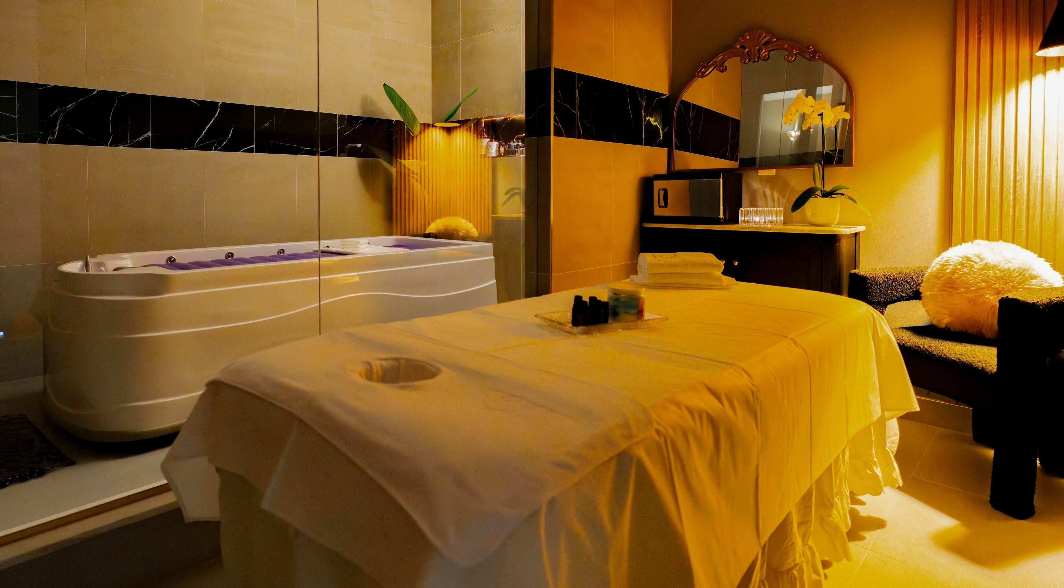 Tranquil massage room with jacuzzi at In The Cloud Spa, Toronto, Ontario, CA, offering ultimate relaxation.