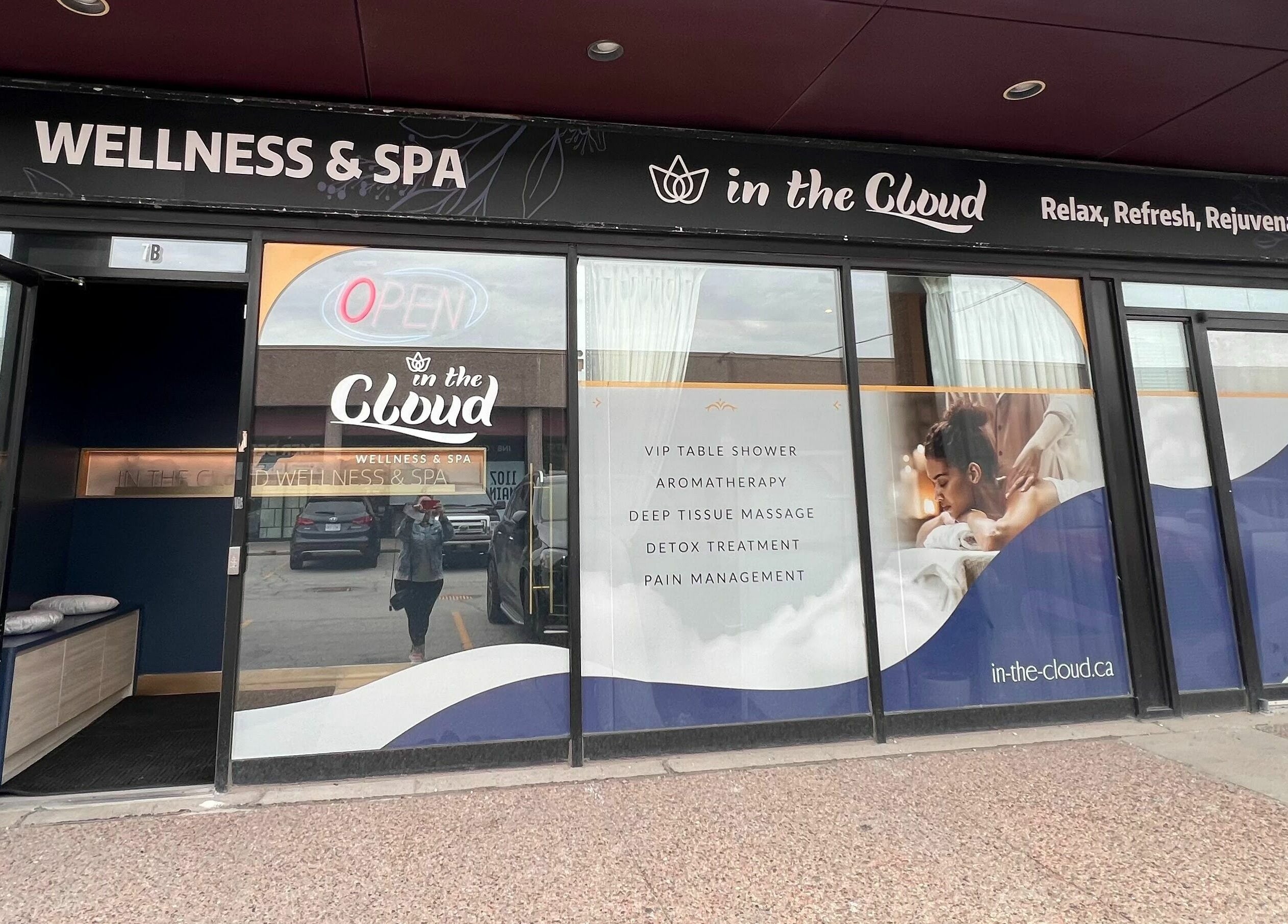 Facade of In The Cloud Spa, Toronto, Ontario, CA with wellness services listed on the storefront.