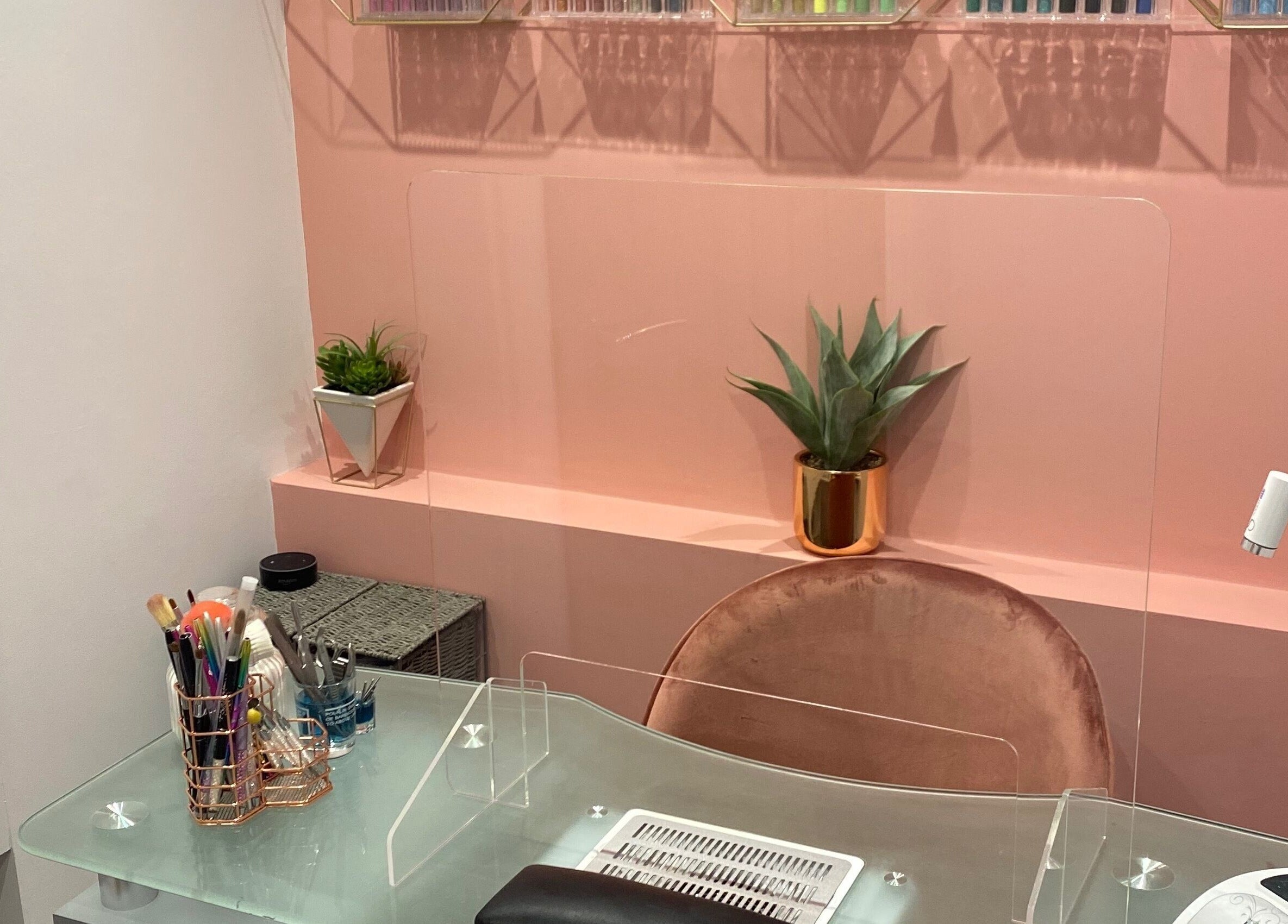 Luxurious Nails interior with stylish nail desk in Ipswich, England, GB featuring chic decor and modern tools.