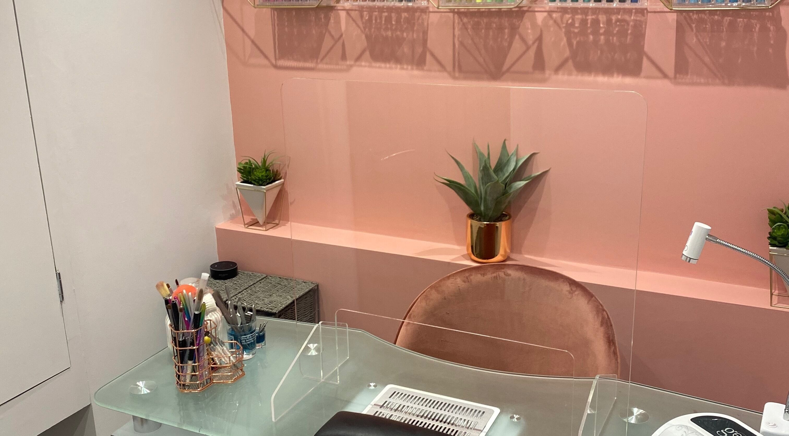 Luxurious Nails interior with stylish nail desk in Ipswich, England, GB featuring chic decor and modern tools.
