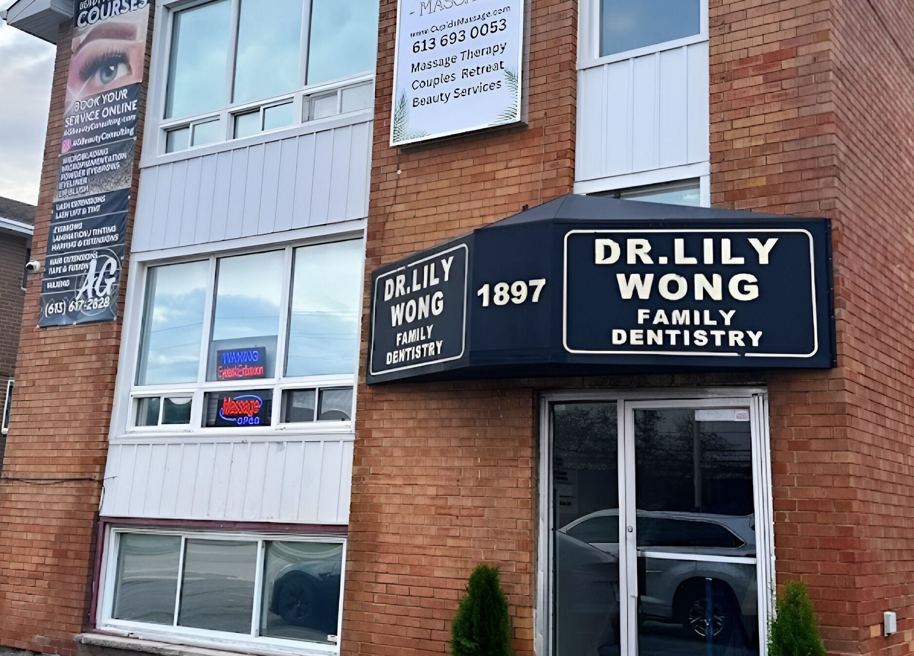Front view of AG Spa | Nepean Baseline in Ottawa, Ontario, CA, with visible massage and beauty service signs.