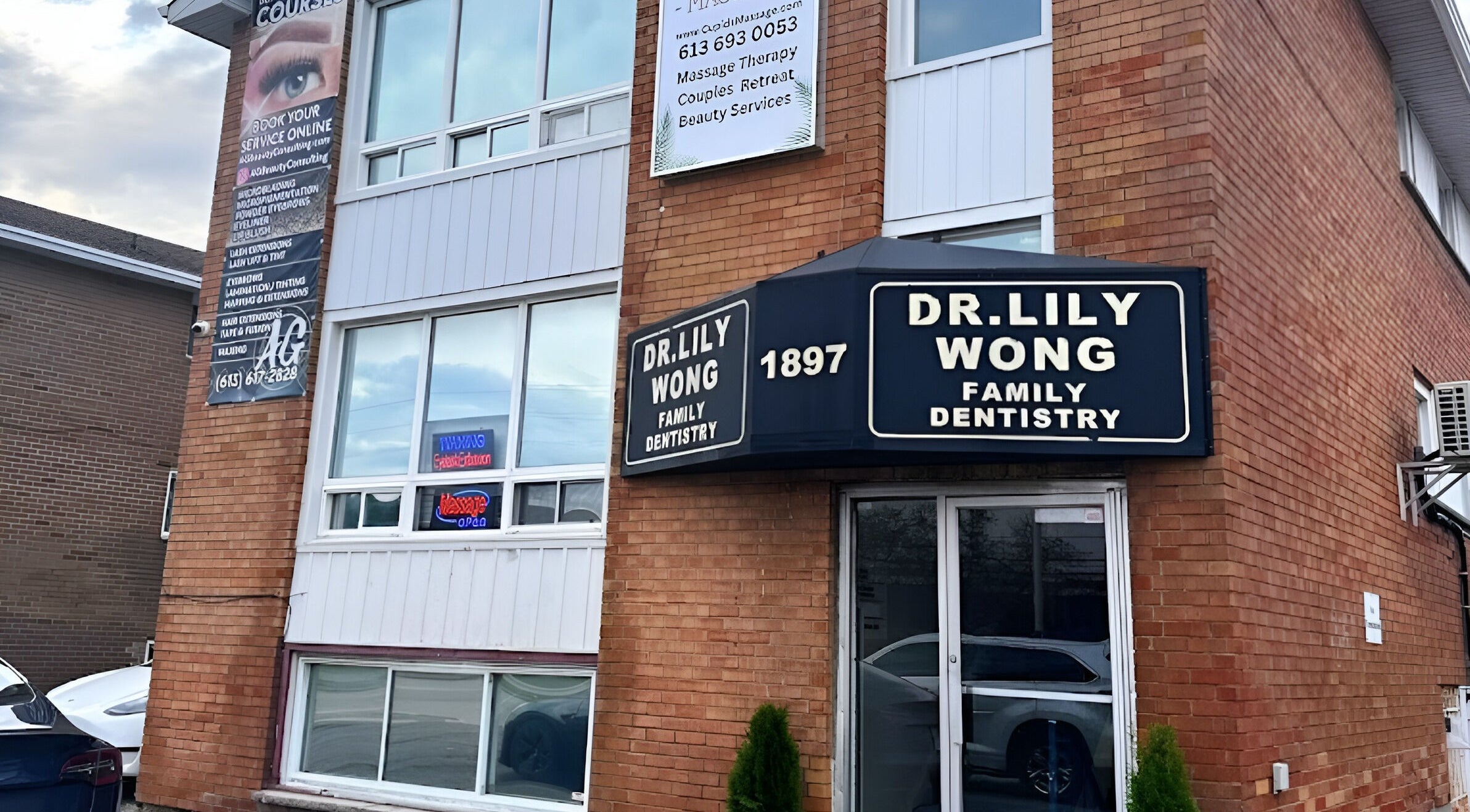 Front view of AG Spa | Nepean Baseline in Ottawa, Ontario, CA, with visible massage and beauty service signs.
