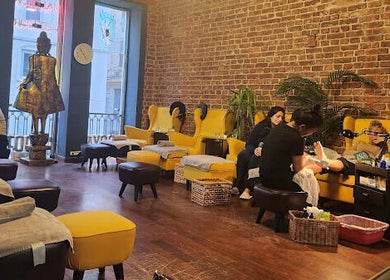 Relaxing massage chairs at Royal Foot Massage - Istanbul, featuring a cozy, inviting atmosphere. İstanbul, TR.