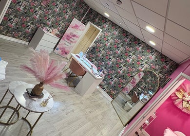Beauty by Alicia's chic salon in Cannock, England featuring floral decor and modern furnishings for a relaxing ambiance.