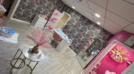 Beauty by Alicia's chic salon in Cannock, England featuring floral decor and modern furnishings for a relaxing ambiance.