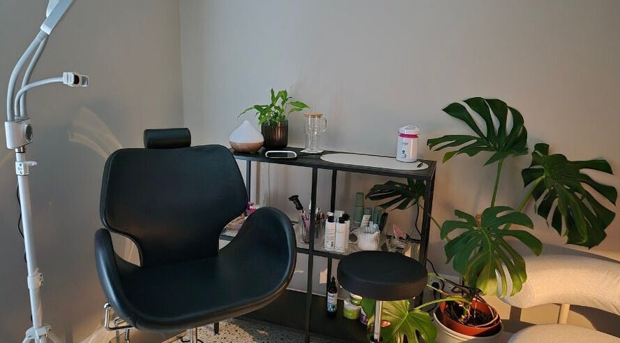 Elegant beauty chair and plant decor at 1.2.be, Paisley, Scotland, GB for a calm wellness experience.