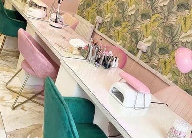 MissSkulpt nail salon in Motherwell, Scotland, GB with stylish chairs and vibrant decor.