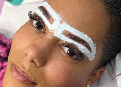 Eyebrow treatment in progress at MHB SALON, Bolton, England, GB. Enhancing natural brows with precision care.