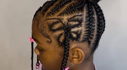 Intricate braided hairstyle for kids at Doll House Luxury, Fairburn, Georgia, US.