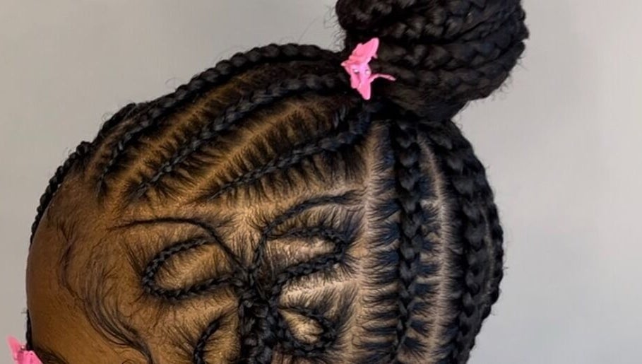 Intricate braided hairstyle at Doll House Luxury, Fairburn, Georgia, US, showcasing expert craftsmanship.