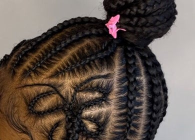 Intricate braided hairstyle at Doll House Luxury, Fairburn, Georgia, US, showcasing expert craftsmanship.