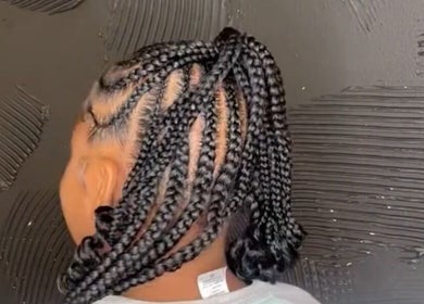 Intricate braids at Doll House Luxury in Fairburn, Georgia, US, showcasing expert styling and detail.
