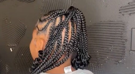 Intricate braids at Doll House Luxury in Fairburn, Georgia, US, showcasing expert styling and detail.
