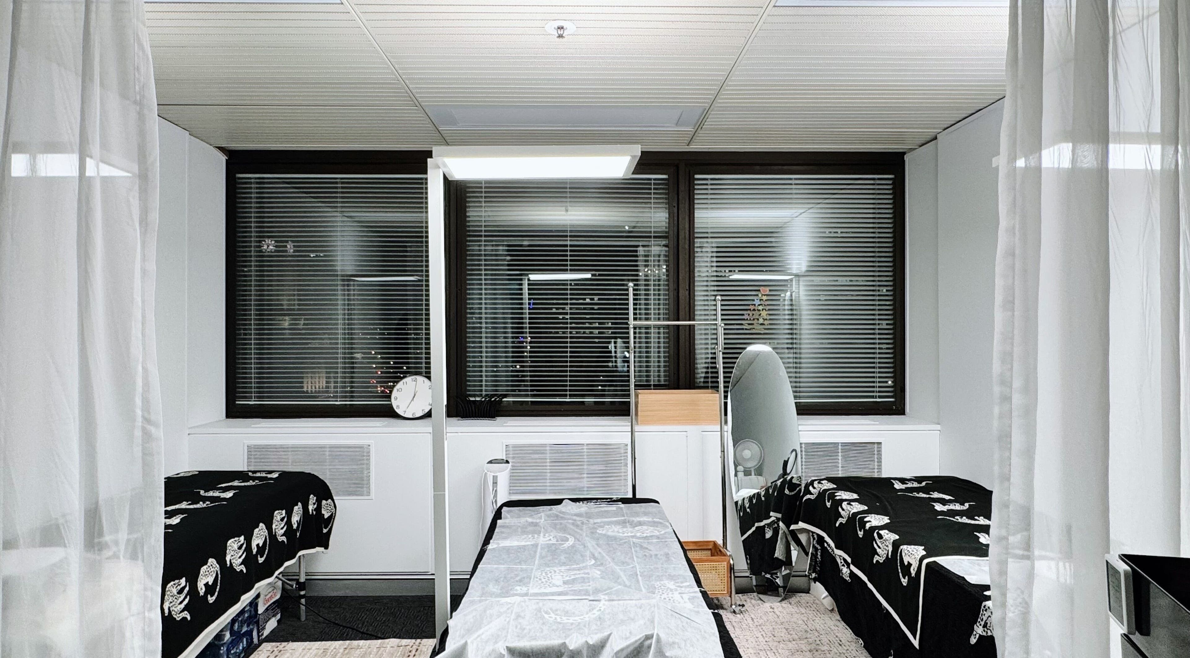 Calm, inviting treatment room at Monlash in Brisbane City, Queensland, AU, showcasing tranquil decor.