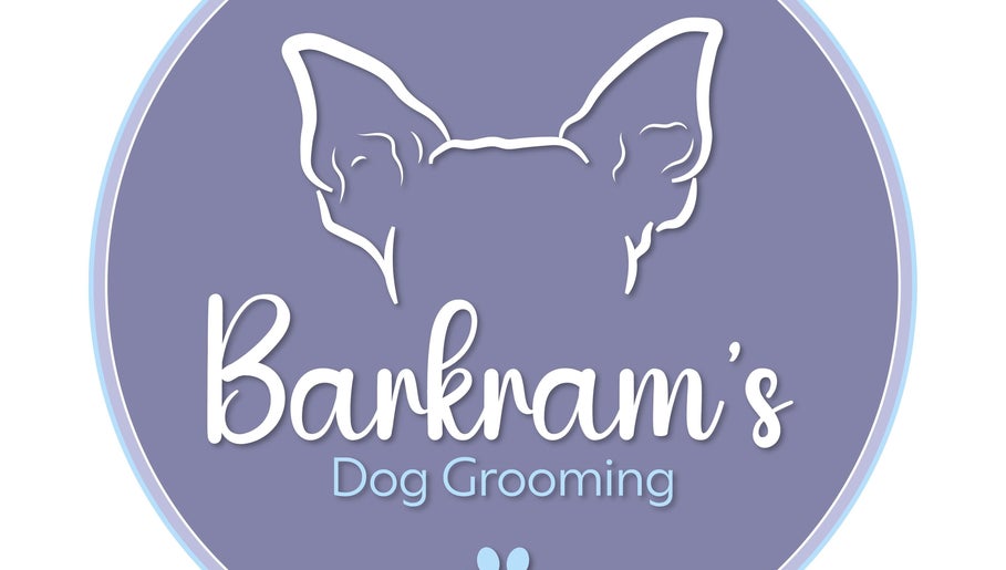 Barkram’s Dog Grooming logo in Foxham, England, GB. Blue background with stylized dog illustration.