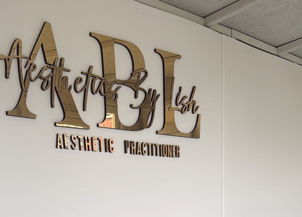 Aesthetics By Lish wall sign in Worcester, England, GB, showcasing elegant aesthetic practitioner branding.