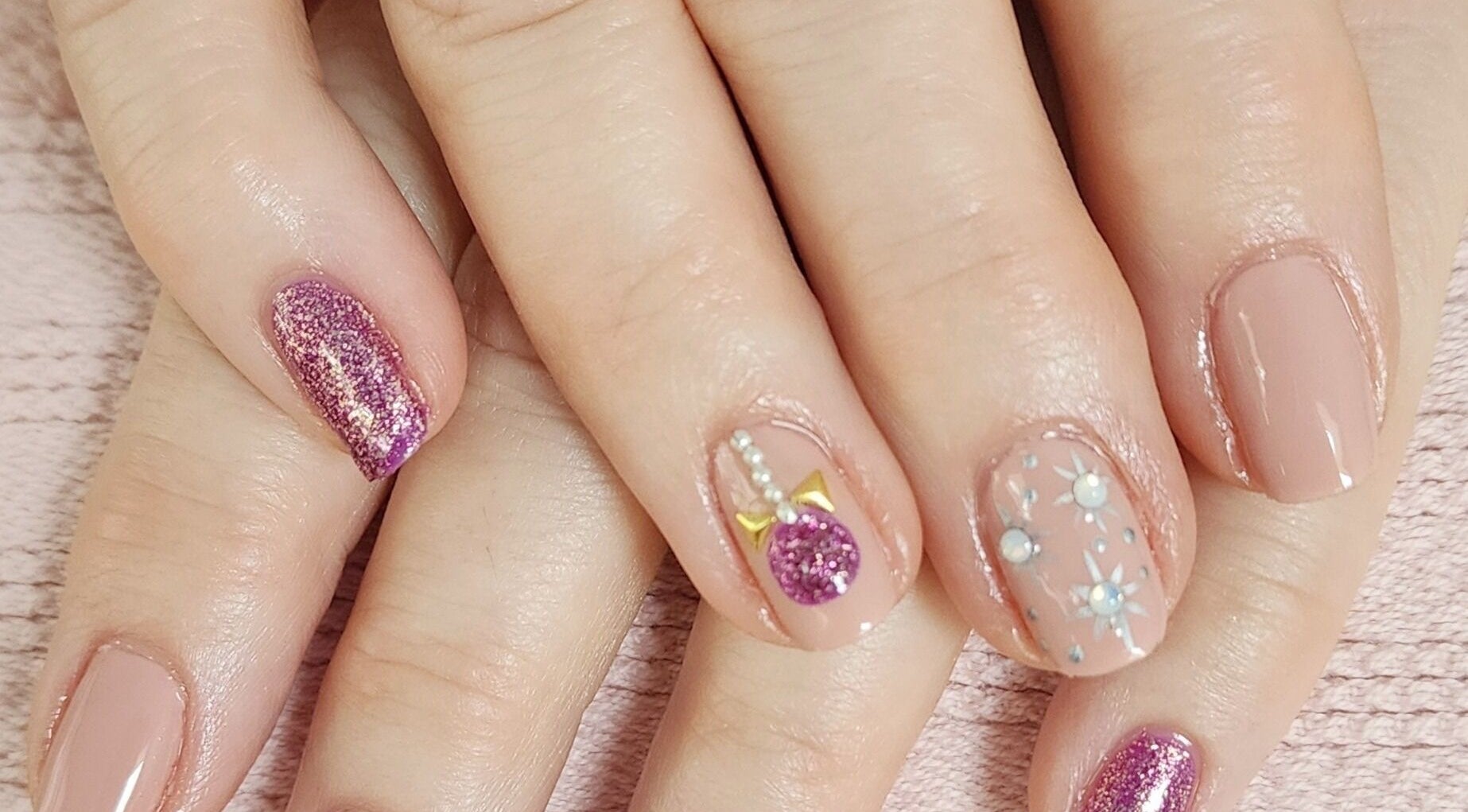 Decorative nail art with glitter and bows at Tactical Nails, Landsborough, Queensland, AU.