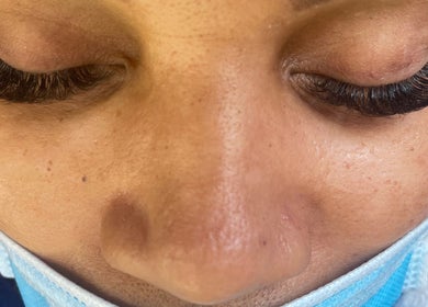 Close-up of elegant eyelash extensions at U’niquely Touched by LJC, Celina, Texas, US.