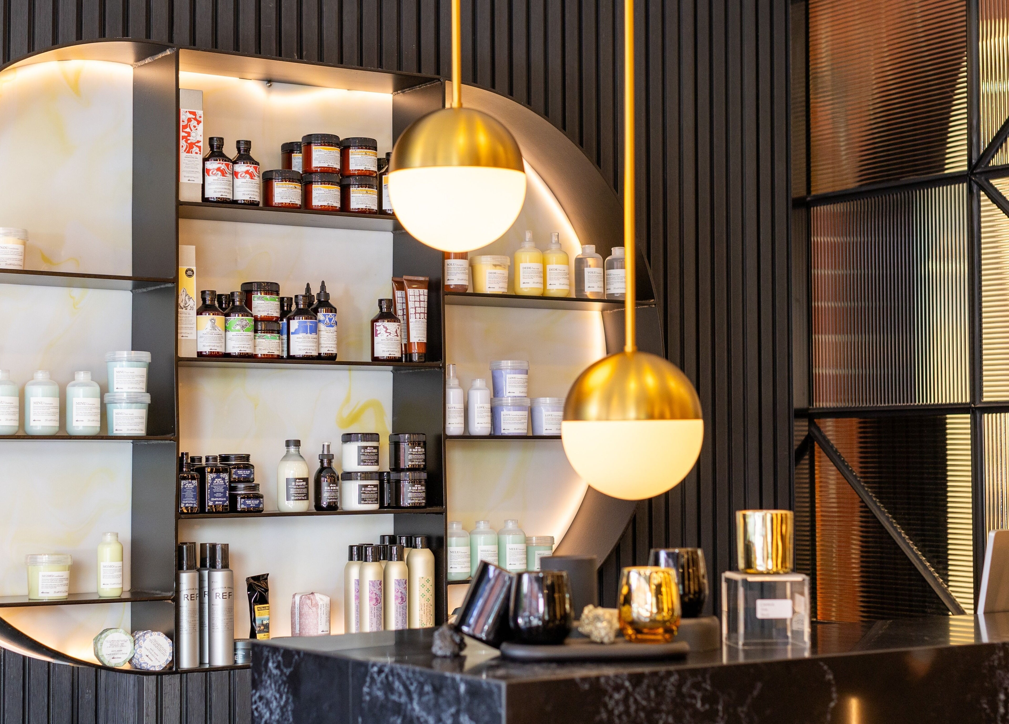 Stylish product display at Eran Benn, Melbourne, Victoria, AU featuring skincare on illuminated shelves.