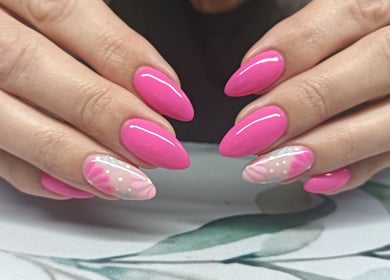 Bright pink and floral nail art at Lumé Beauté, Centurion, Gauteng, ZA showcasing intricate design.