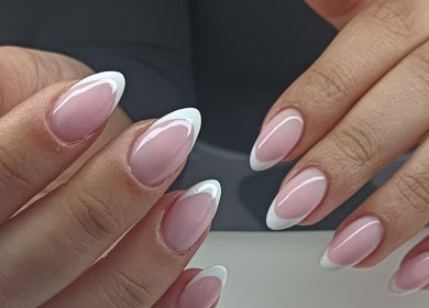 French manicure at Lumé Beauté, Centurion, Gauteng, ZA showcasing pink and white elegant nails.