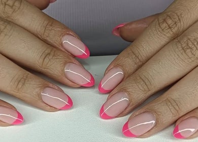 Stylish pink-tipped nails at Lumé Beauté, Centurion, Gauteng, ZA - elegant nail design service.
