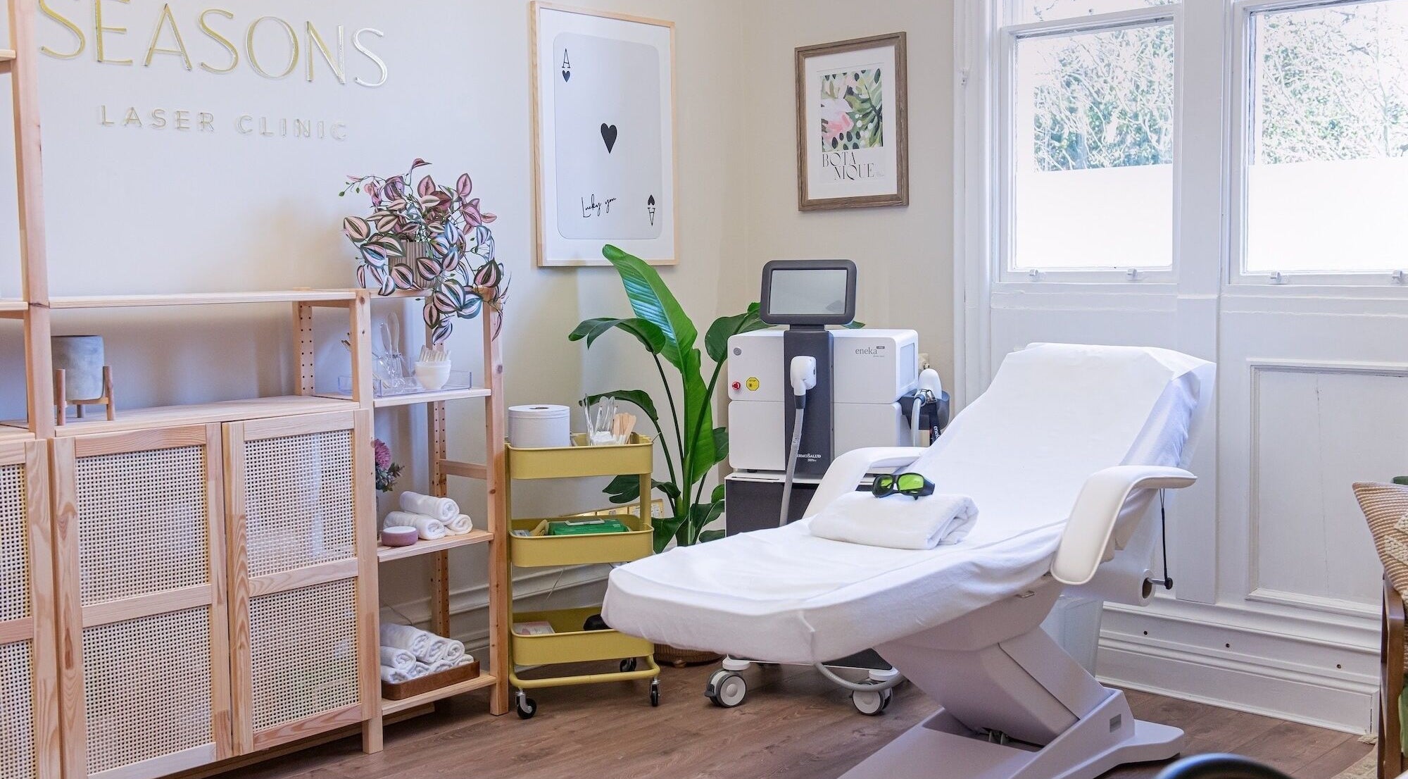 Cozy treatment room at Seasons Laser Clinic in Manchester, GB, featuring elegant decor and advanced equipment.