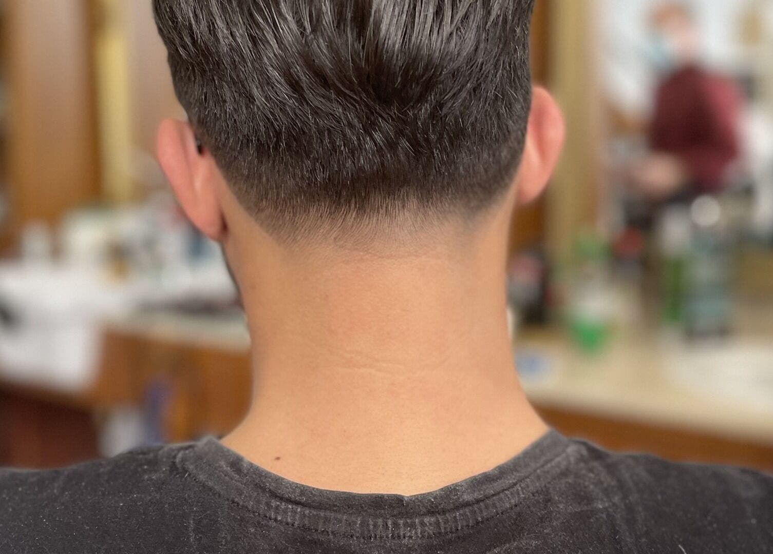 Close-up of a man's fresh haircut at The Old Barber House, Paphos, Paphos, CY.