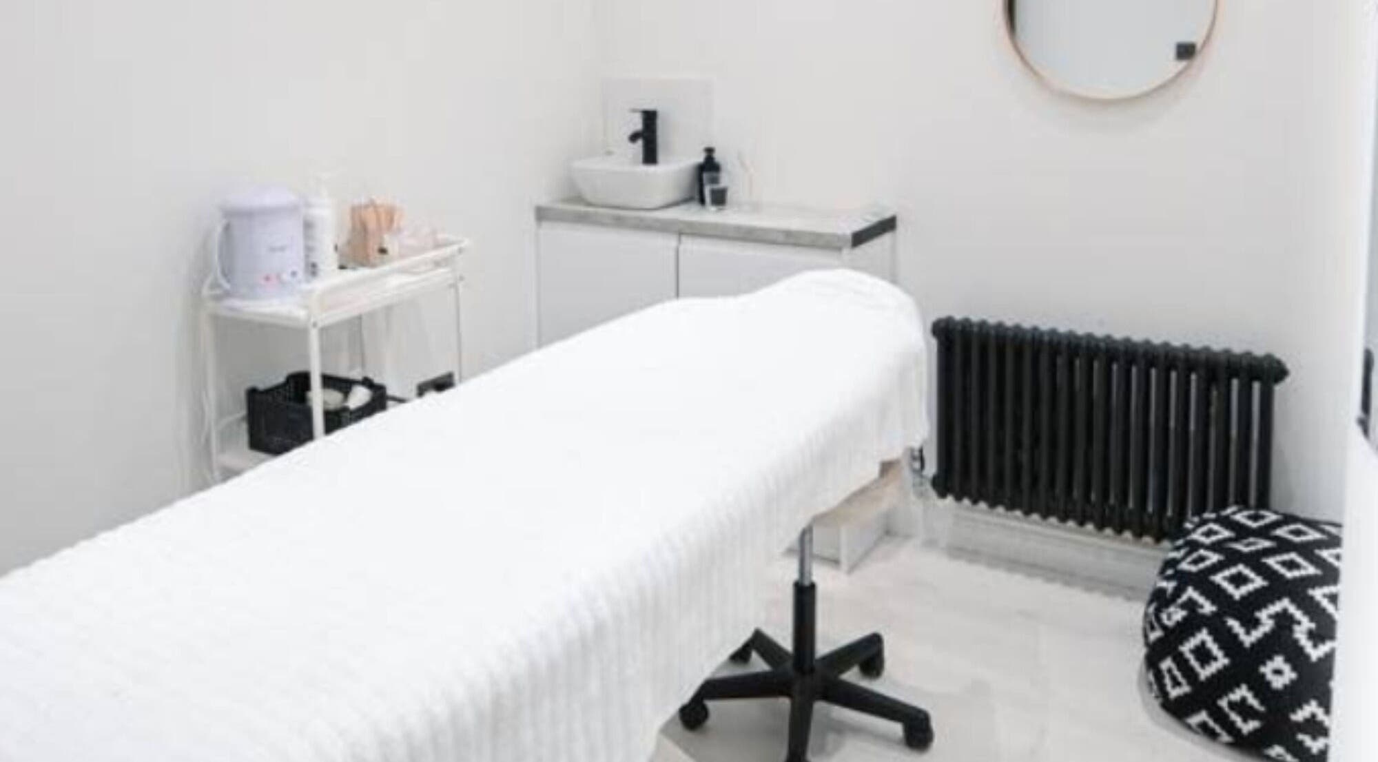Minks By Mc spa room in Liverpool, England, GB featuring a treatment bed and modern decor.