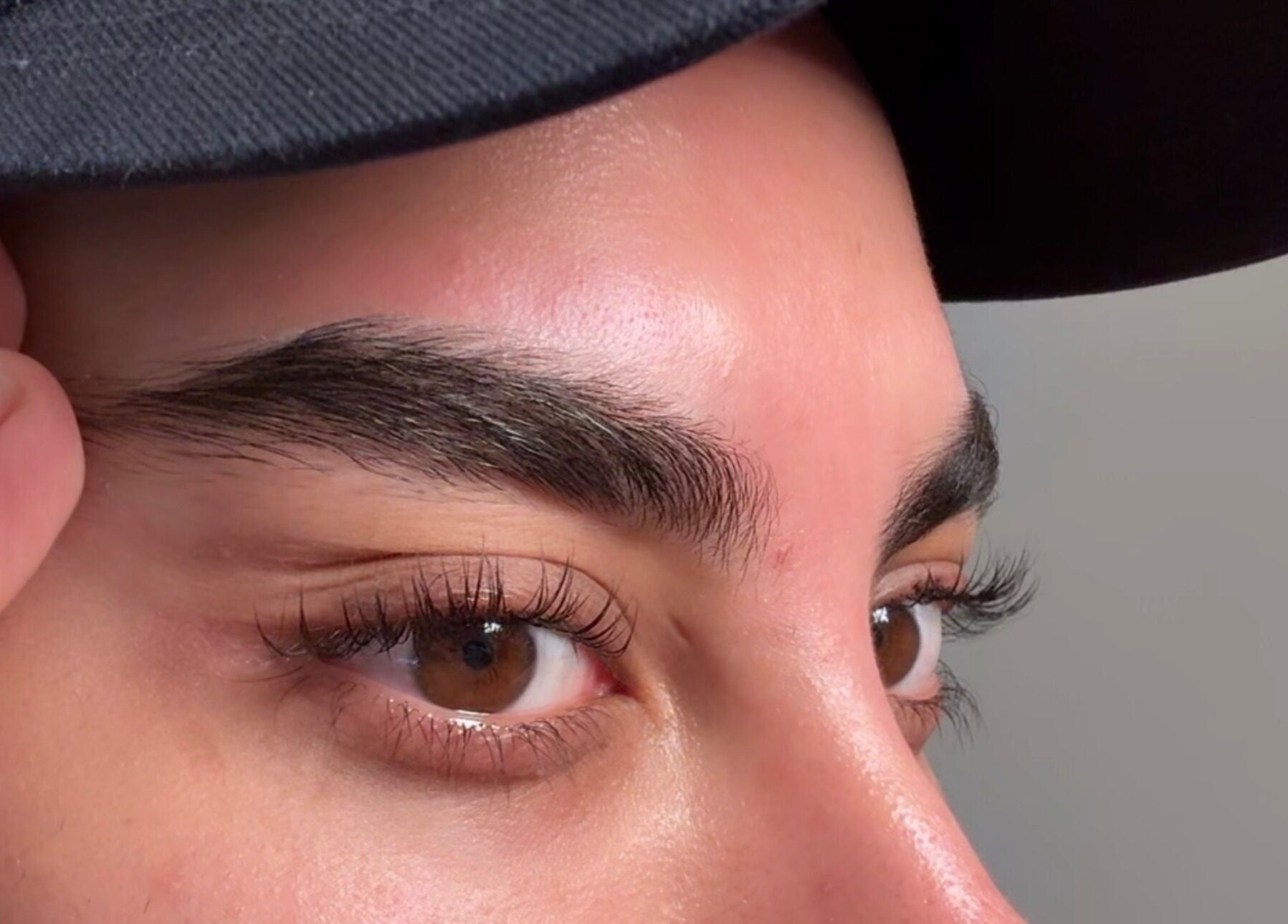 Close-up of expertly shaped eyebrows and lashes at Minks By Mc, Liverpool, England, GB.
