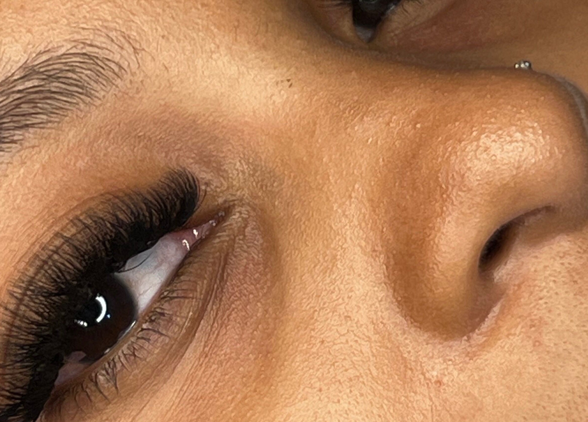 Close-up of expertly styled eyelashes at D’Lux Atelier, Kingston, St. Andrew Parish, JM.