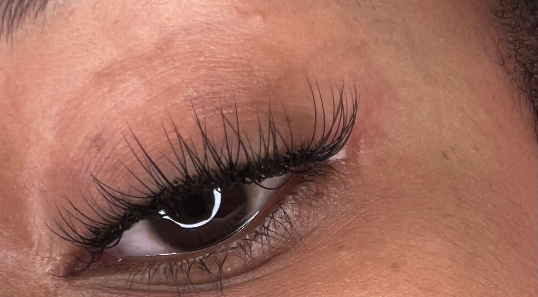 Close-up of elegant eyelash extensions by D’Lux Atelier, Kingston, St. Andrew Parish, JM.