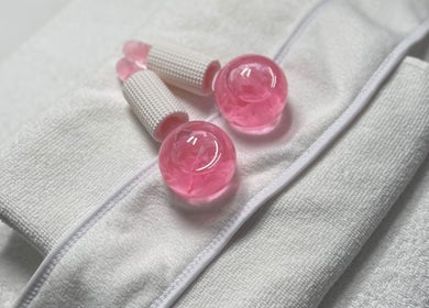 Pink therapy balls and tools on a towel at NeuGlo Skin, Burton on Trent, England, GB.