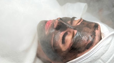 Relaxing facial spa treatment with a charcoal mask at NeuGlo Skin in Burton on Trent, England, GB.