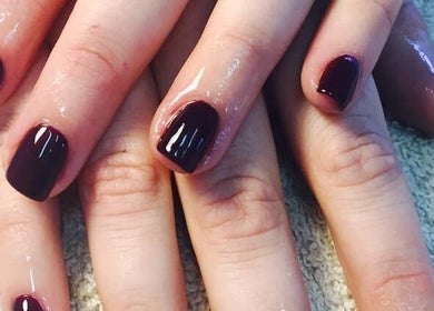 Dark polished nails showcased at Beauty Spot Salon, Port Elizabeth, Eastern Cape, ZA.